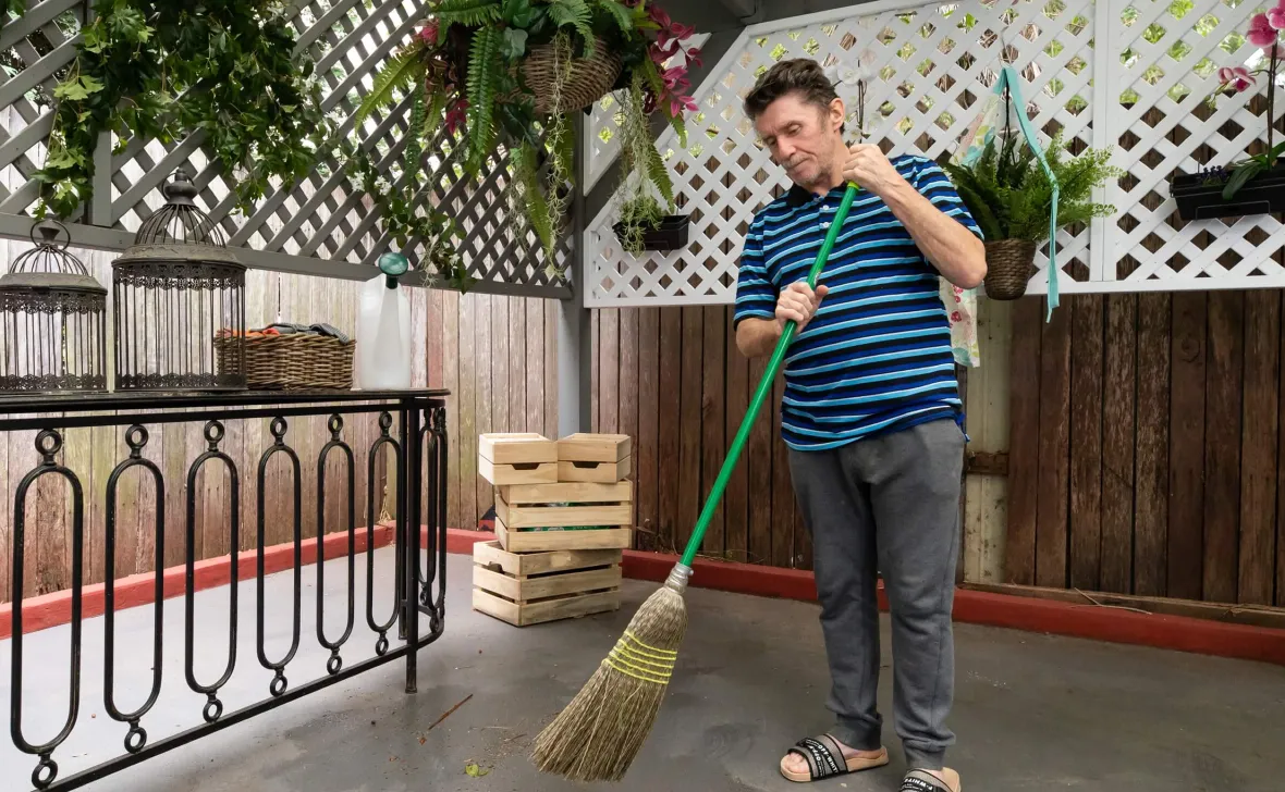 Annandale Grove resident sweeping