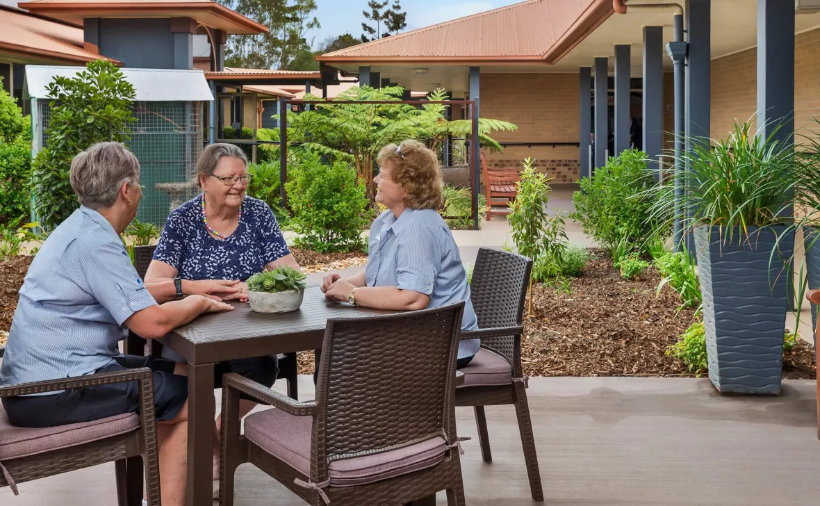 Carseldine Greens residents at outdoor table