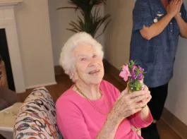 Lois with flowers