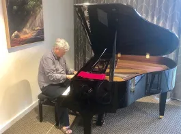 Roy playing the piano