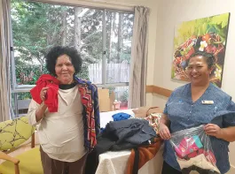 Cindy receiving her clothes