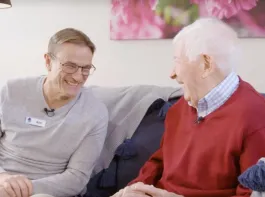 Opal Resident and Team member laughing
