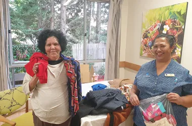 Cindy receiving her clothes