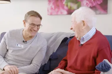 Opal Resident and Team member laughing