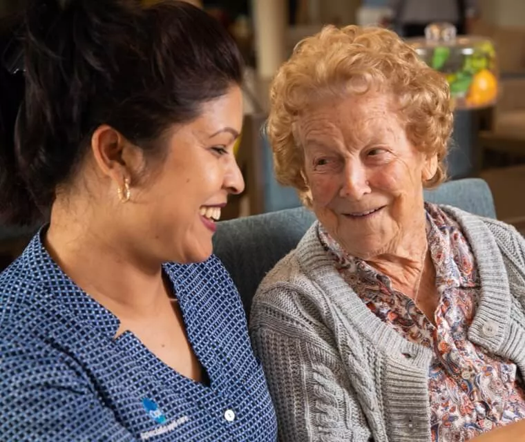 Opal team member and resident talking
