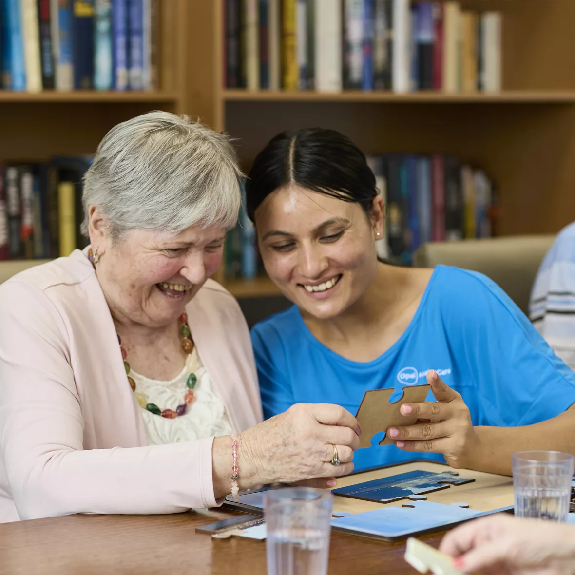 Opal resident and team member at library 