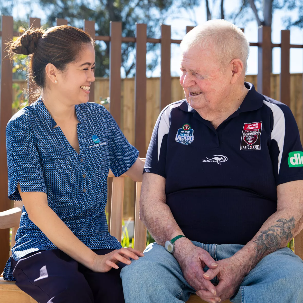 Team member and resident talking